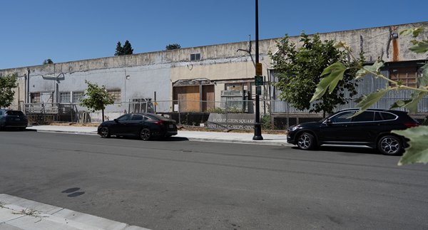 Derelict Warehouse Between La Via Apartments and Brewsters, a vacant property in downtown Petaluma